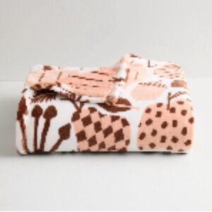 Cozy Pink and Brown Patterned Blanket